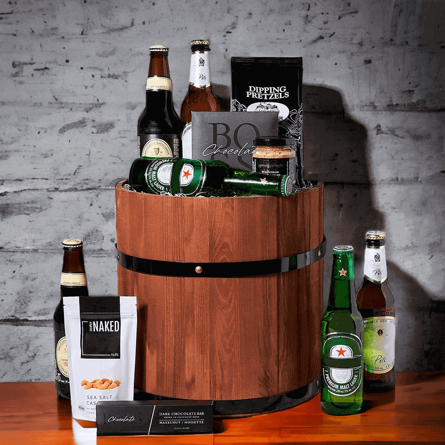 Highlights of this gift include chocolate, a dark chocolate hazelnut bar, sea salt cashews, whole grain garlic mustard, pretzels, a wooden gift barrel, and last but not least, six bottles of beer.