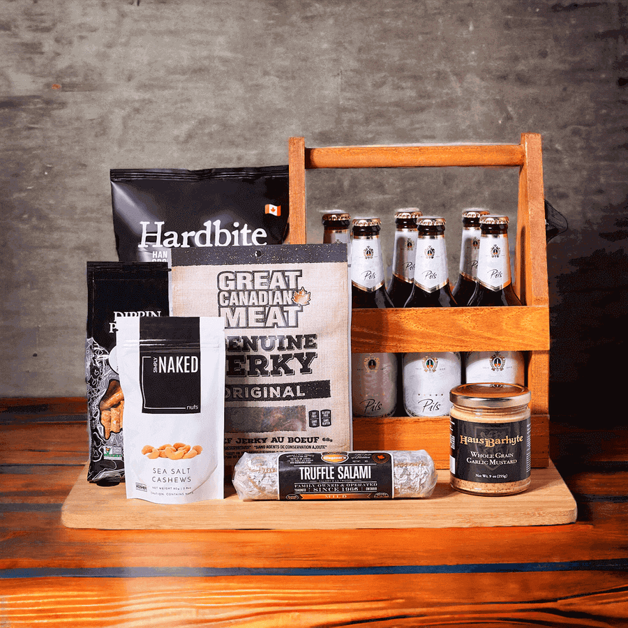 Featured are six bottles of beer, a sturdy wooden beverage carrier, and a large bamboo cutting board.