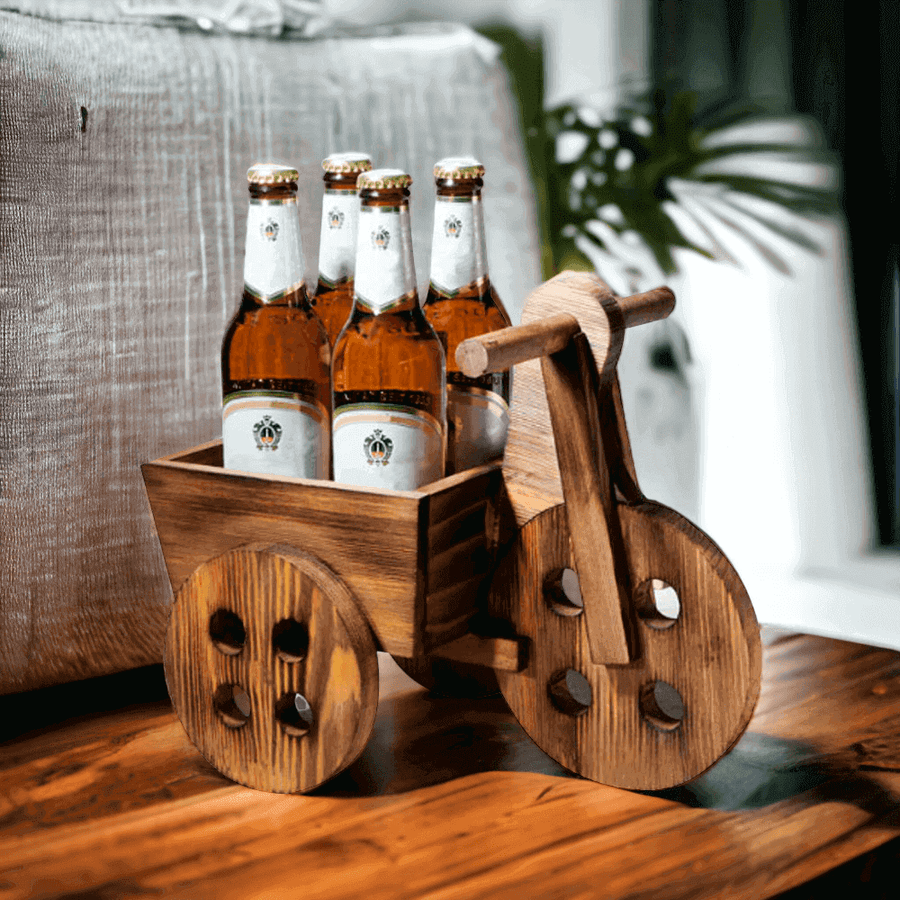 This gift set includes four beers placed in a rustic wooden cart. 
